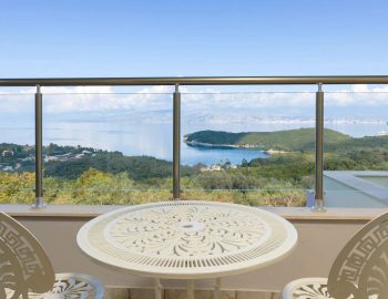 villa white stone kassiopi corfu greece balcony sitting area