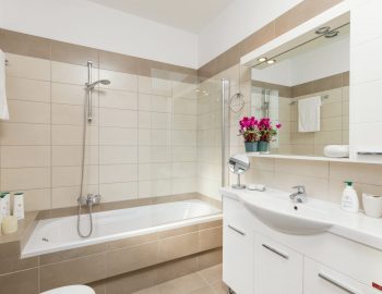 villa white stone kassiopi corfu greece bathroom with bathtub