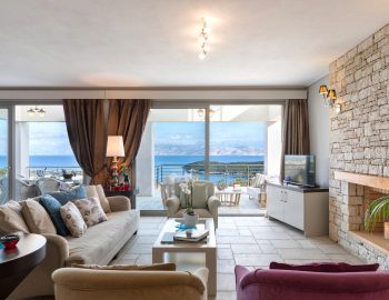 villa white stone kassiopi corfu greece living room with fireplace