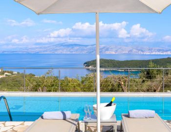 villa white stone kassiopi corfu greece pool and sea view