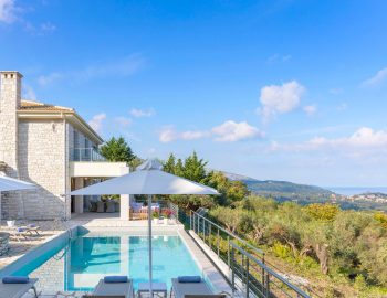 villa white stone kassiopi corfu greece pool view