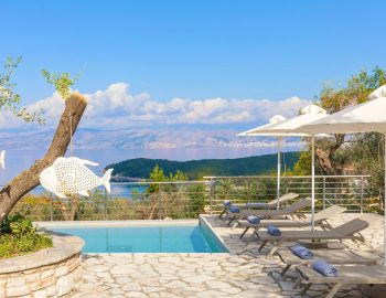 villa white stone kassiopi corfu greece pool yard