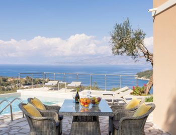 villa yellow stone kassipi cofu greece outdoor dining with sea view