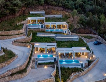 z4 luxury villa bita lefkada night four villas trees mountain parking area buildings swimming pool lights stairs