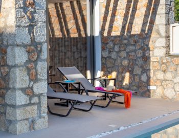 z4 luxury villa bita lefkada swiming pool shadows sun beach chairs
